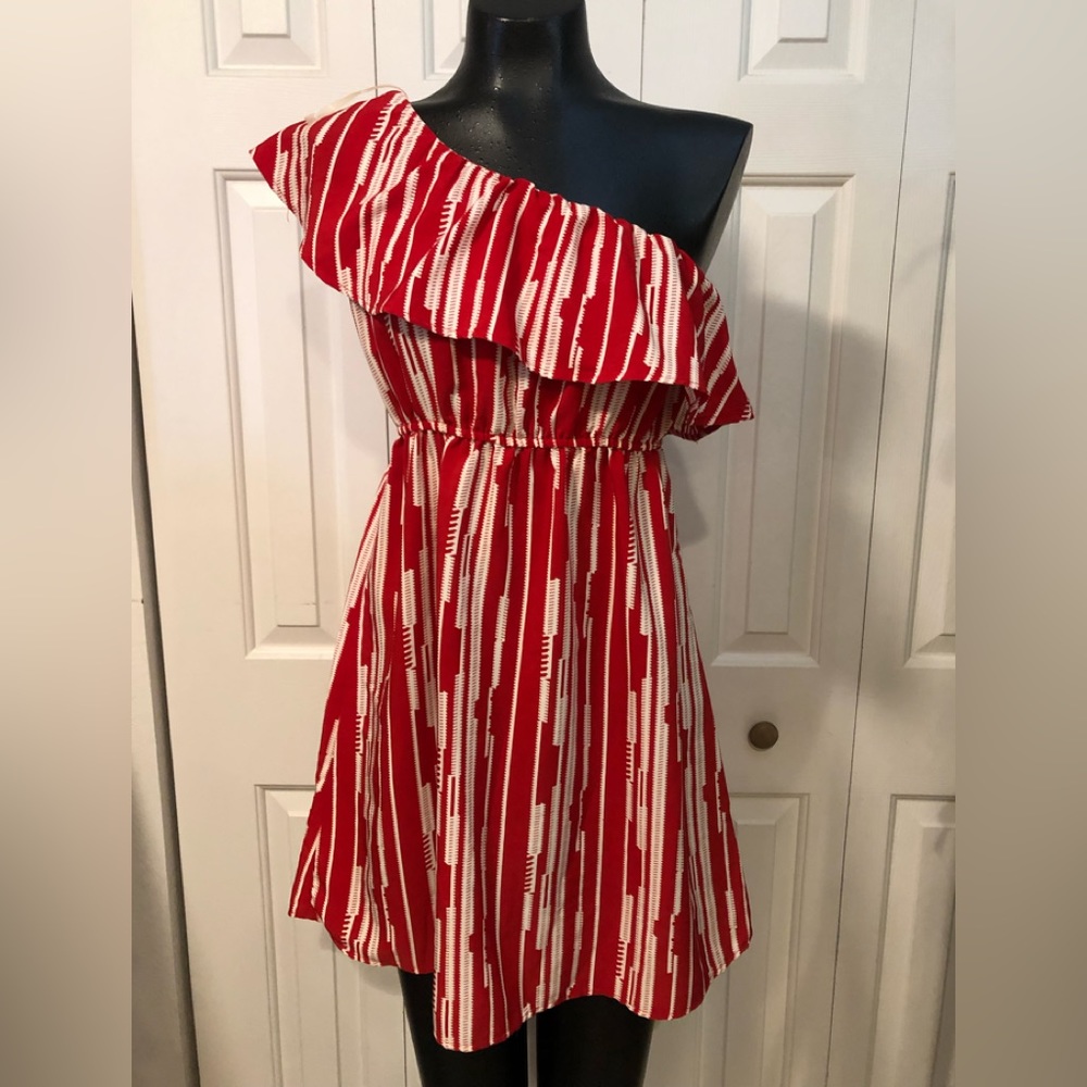 Women’s brand new one strap above knee dress.
